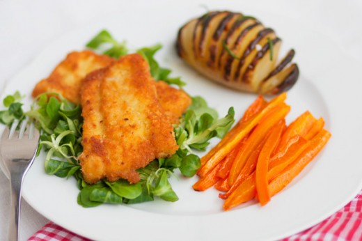 Filetti di merluzzo con hasselback potatoes e carote al cumino